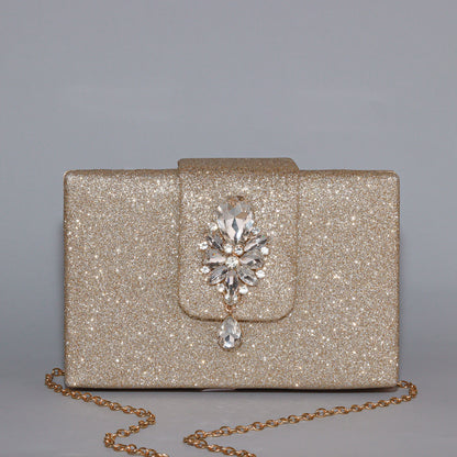 Opulent Gold Glitter Clutch with Exquisite Crystal Brooch