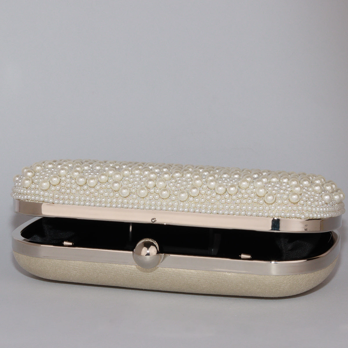 Elegant Pearl-Encrusted Clutch with Chic Metallic Gold Back