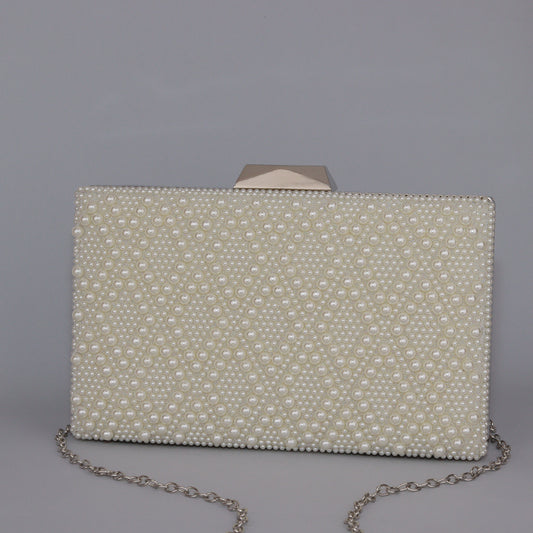 Elegant Pearl-Encrusted Clutch with Golden metalic backside