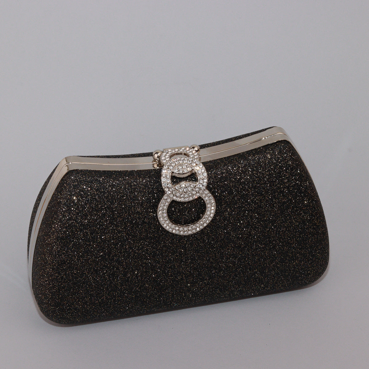 Glamour Clutch with Elegant Shape & Sparkling Circular Clasp