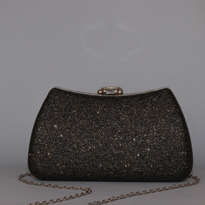 Glamour Clutch with Elegant Shape & Sparkling Circular Clasp