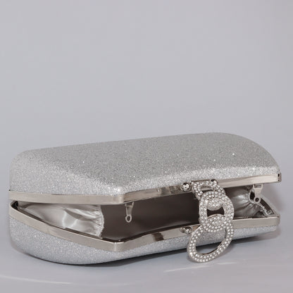 Glamour Clutch with Elegant Shape & Sparkling Circular Clasp