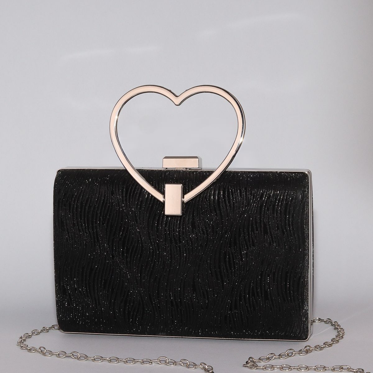 Wavy Pattern Shimmering Clutch with Heart-Shaped Handle