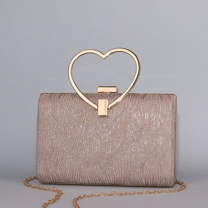 Wavy Pattern Shimmering Clutch with Heart-Shaped Handle