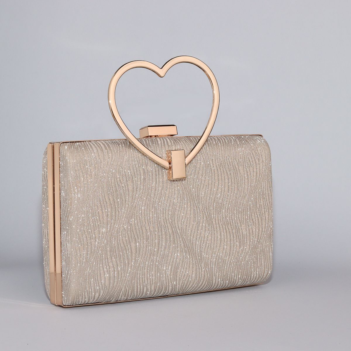 Wavy Pattern Shimmering Clutch with Heart-Shaped Handle