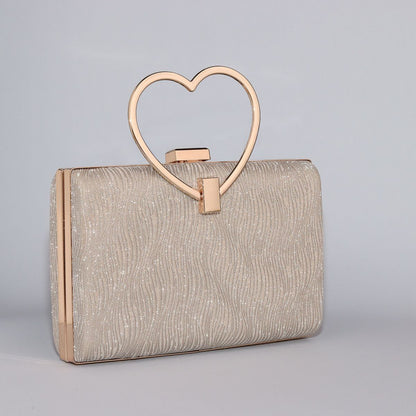 Wavy Pattern Shimmering Clutch with Heart-Shaped Handle