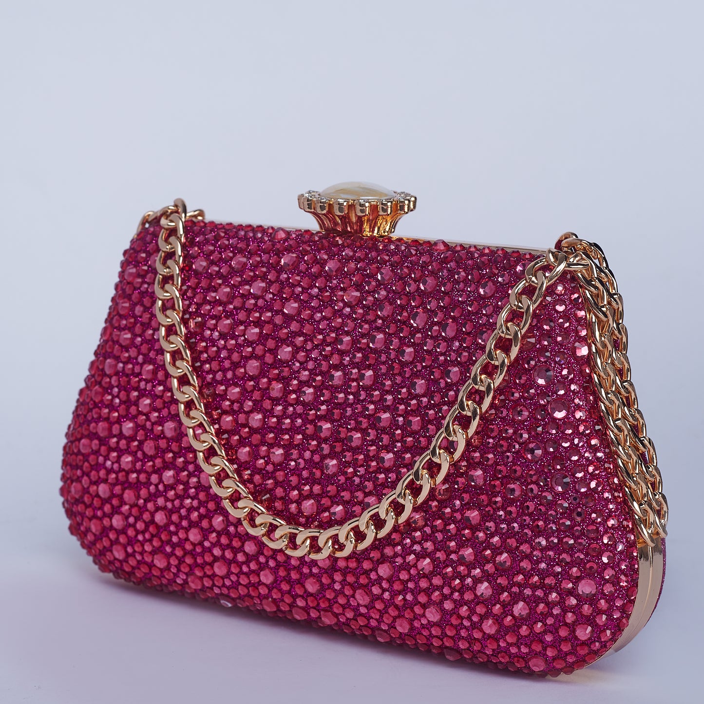 Vibrant Twilight Crystal-Encrusted Clutch with Gleaming double Chain Handle & Marble design lock