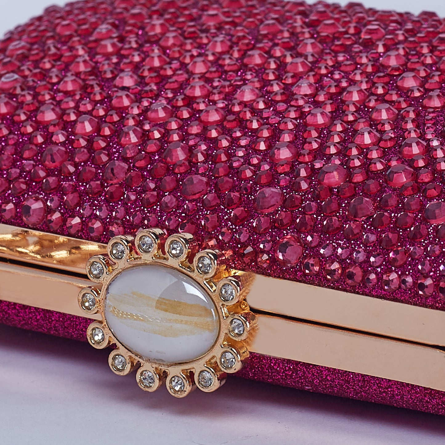 Vibrant Twilight Crystal-Encrusted Clutch with Gleaming double Chain Handle & Marble design lock