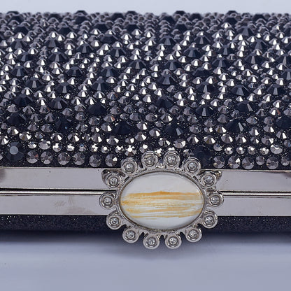 Vibrant Twilight Crystal-Encrusted Clutch with Gleaming double Chain Handle & Marble design lock