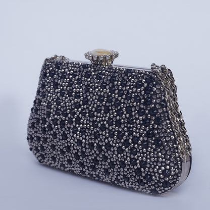 Vibrant Twilight Crystal-Encrusted Clutch with Gleaming double Chain Handle & Marble design lock