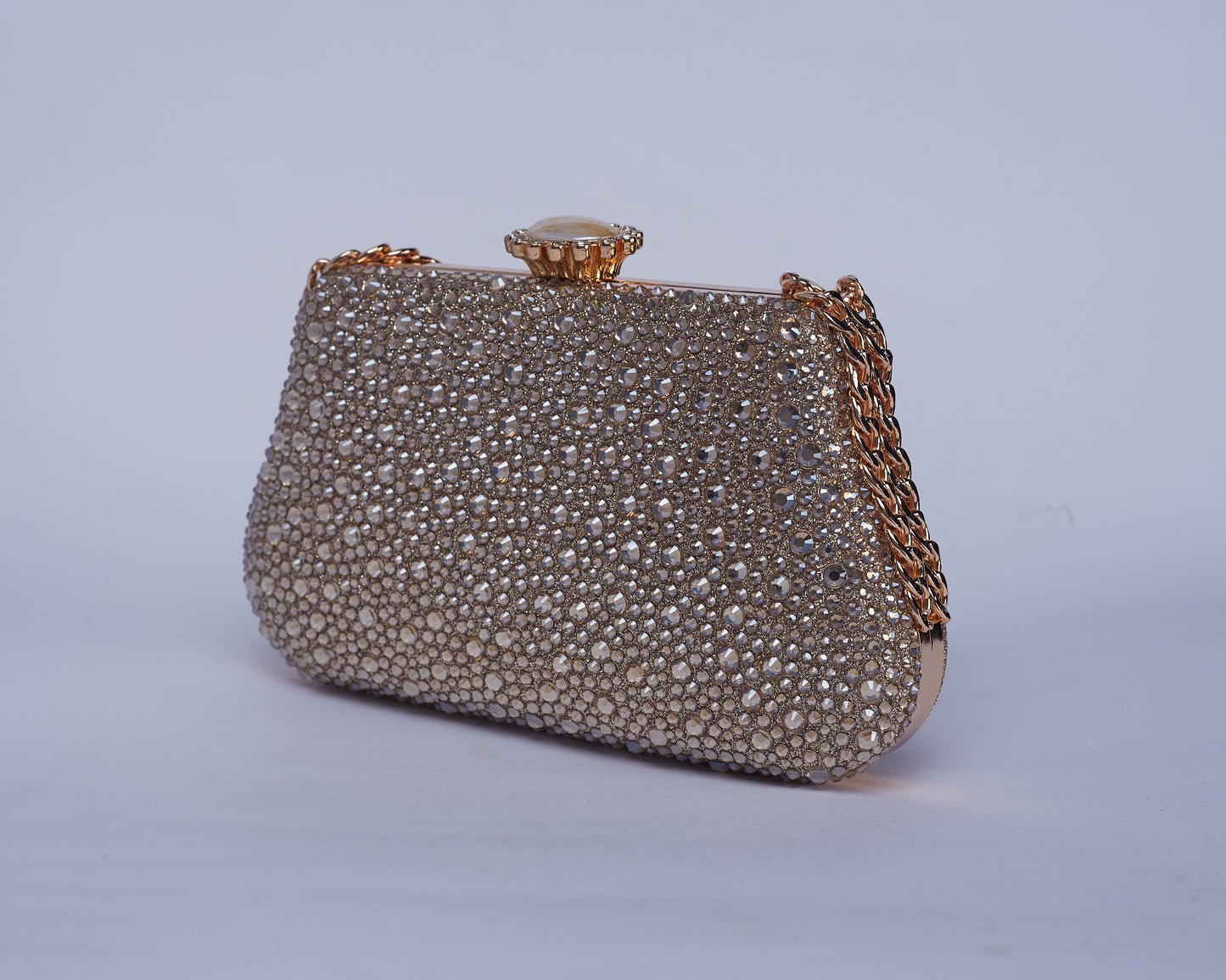 Vibrant Twilight Crystal-Encrusted Clutch with Gleaming double Chain Handle & Marble design lock