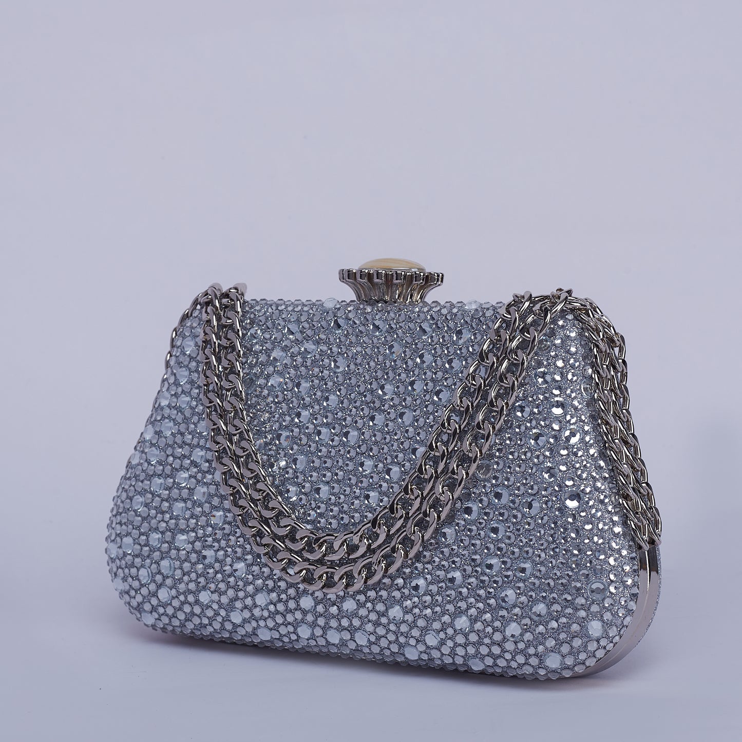 Vibrant Twilight Crystal-Encrusted Clutch with Gleaming double Chain Handle & Marble design lock