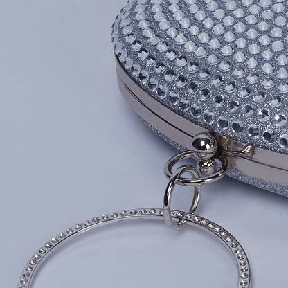 Glitz & Glam Oval Clutch with Circular Strass Handle with Glittering Chic Back