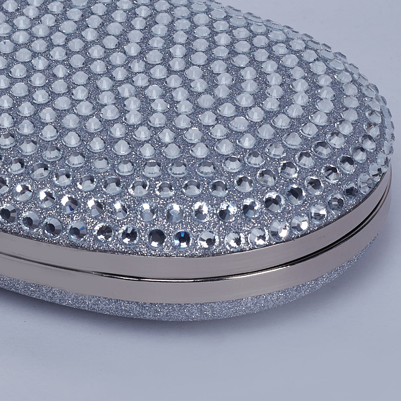 Glitz & Glam Oval Clutch with Circular Strass Handle with Glittering Chic Back